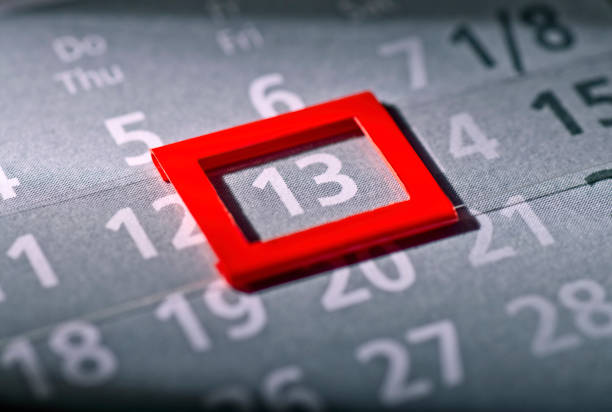 Friday the 13th on a calendar A red frame marks Friday the 13th on a calendar friday the 13th stock pictures, royalty-free photos & images