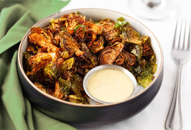 Fried Brussel Sprouts with Dipping Sauce stock photo