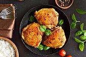 istock Fried chicken thighs in plate 1314547764
