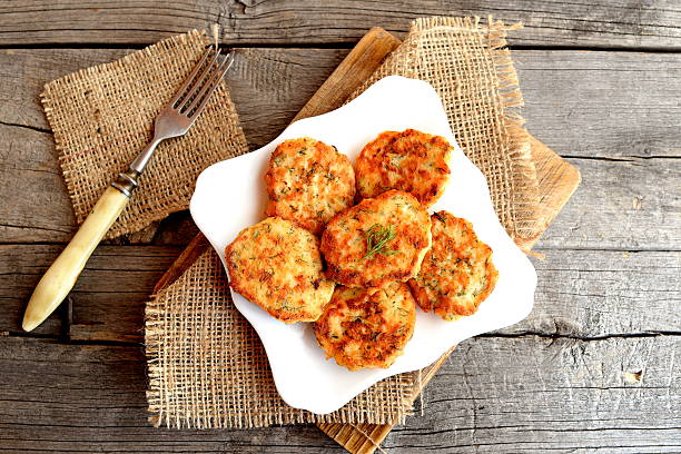 Fried fish cakes on a plate stock photo