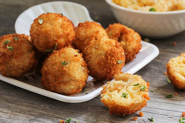 Fried Mac and cheese balls, selective focus stock photo