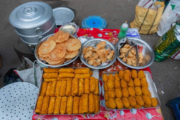 Fried pork and other snacks for sale, Kolkata, India stock photo