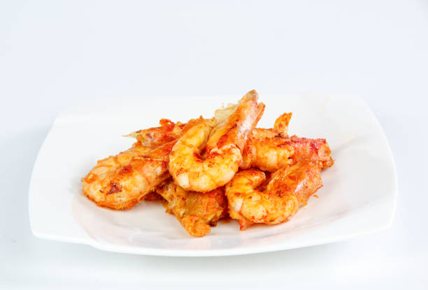 Fried shrimp isolated on white background Fried shrimp isolated on white background taiwan food prawn snack stock pictures, royalty-free photos & images
