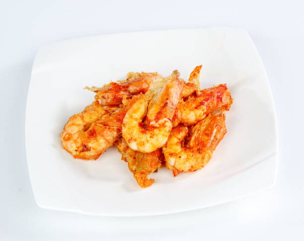 Fried shrimp isolated on white background Fried shrimp isolated on white background taiwan food prawn snack stock pictures, royalty-free photos & images