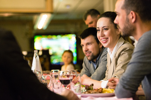 Friends Having A Good Time At Dinner Stock Photo - Download Image Now