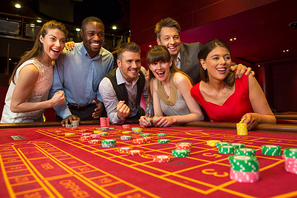 60 Diverse Group Of People Playing Roulette In A Casino Stock Photos, Pictures & Royalty-Free Images - iStock