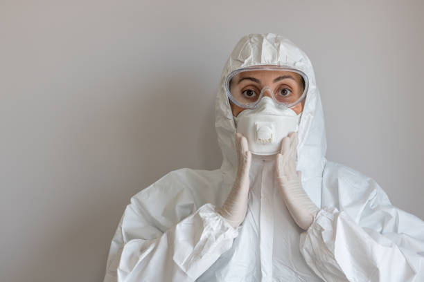 Frightened Doctor with Medical Coverall stock photo