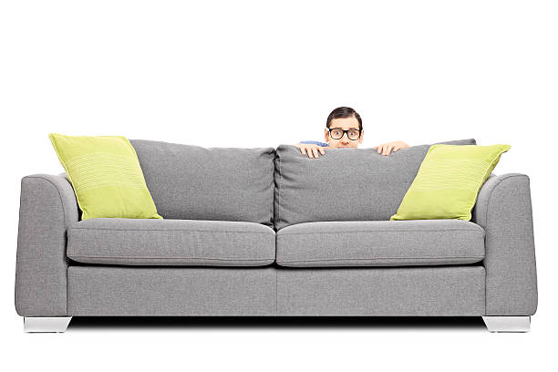 frightened-man-hiding-behind-a-sofa-picture-id469555655?k=6&m=469555655&s=612x612&w=0&h=Tk8w_x2rkjWE7AVYcSb8RbVV3EtsP33o0JYmRGmehZU=