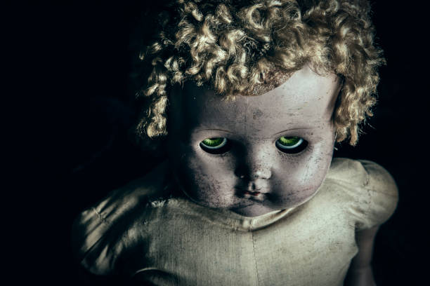 Frightening Dirty Old Baby Doll stock photo
