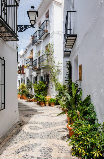 Frigiliana street. Typical mosaic of the pavement. View of a street in Frigiliana, a white town in Malaga. malaga stock pictures, royalty-free photos & images