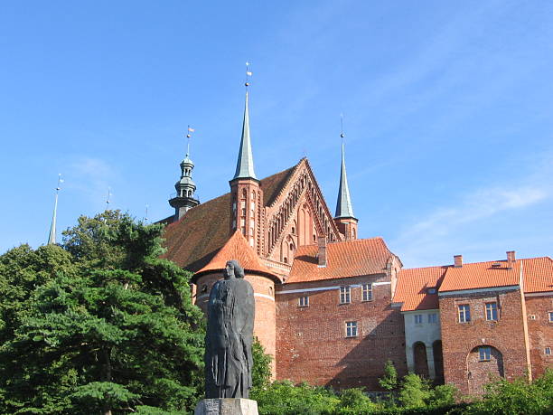 Frombork Cathedra with a statue of Copernicus stock photo