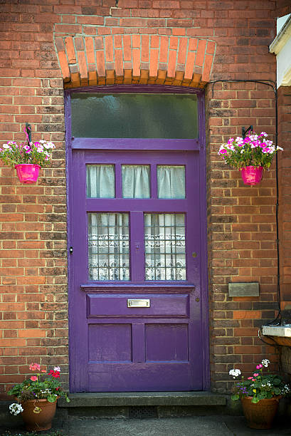 Front Door Front Door Of A Victorian House In England purple front main door stock pictures, royalty-free photos & images