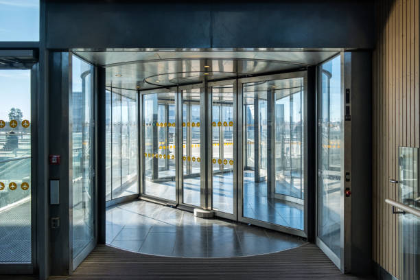 Front revolving transparent automatic rotate door Front revolving transparent automatic rotate door in the airport automatic stock pictures, royalty-free photos & images