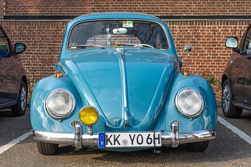 Roermond, Province Limburg, The Netherlands, 06.03.2022, Beautiful, vintage, customized Volkswagen beetle in blue colour parked in the street