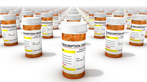 Front view of Pill Bottles Endless Pill Bottles xanax pills stock pictures, royalty-free photos & images