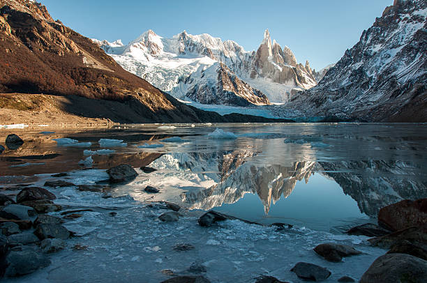 Frozen lake reflection at the Cerro Torre, Fitz Roy, Argentina stock photo