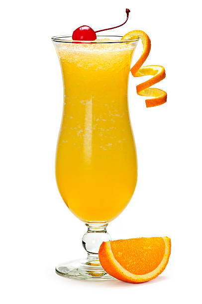 Frozen orange fruit drink in tall dacqueri glass Glass of orange drink in hurricane cocktail glass screwdriver drink stock pictures, royalty-free photos & images