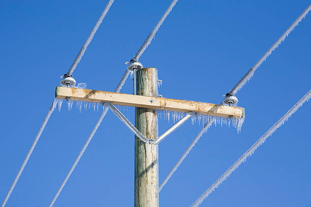 Frozen Power Lines  power cable stock pictures, royalty-free photos & images