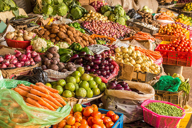 Fruit and Vegetable Market Colorful fruits and vegetables colorfully arranged at a local fruit and vegetable market in Nairobi, Kenya. east africa stock pictures, royalty-free photos & images