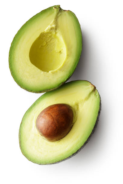 fruit: avocado geïsoleerd op witte achtergrond - avocado stockfoto's en -beelden