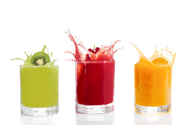 Fruit juice in glasses, Kiwi, currants, orange stock photo