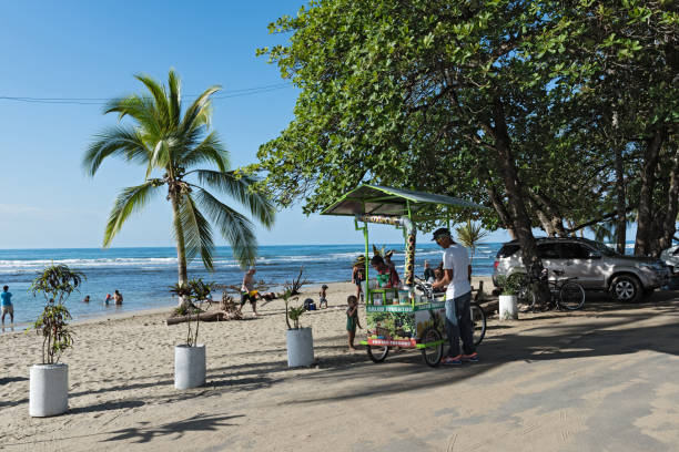 Fruit juice sellers at the beach in Puerto Viejo, Costa Rica stock photo