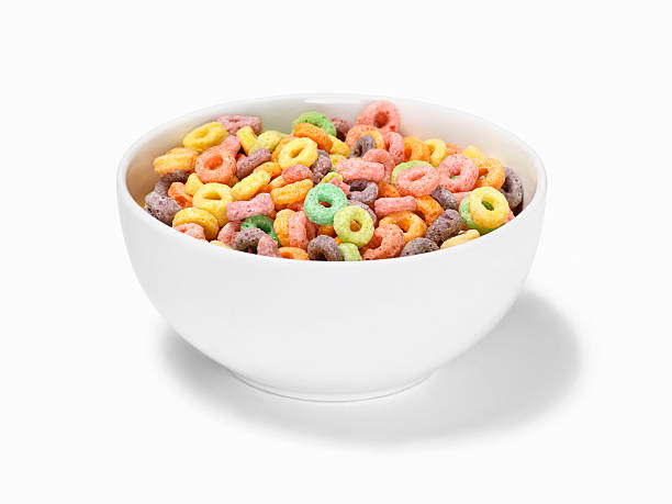 Fruit Ring Breakfast Cereal Fruit Ring Breakfast Cereal with Natural Shadow and Clipping Path-Photographed on Hasselblad H1-22mb Camera breakfast cereal stock pictures, royalty-free photos & images