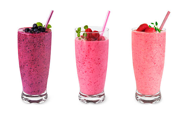 Fruit smoothies Three fruit smoothies - isolated on white. strawberry smoothie stock pictures, royalty-free photos & images