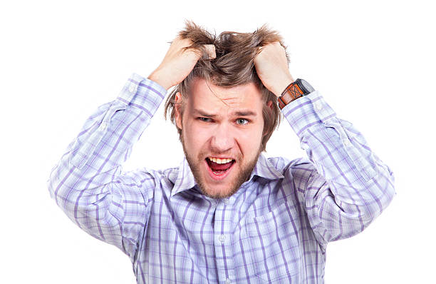 frustrated young man stock photo