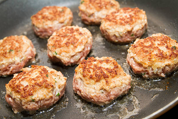 Fry meatballs in the pan stock photo