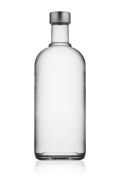 Full closed bottle of vodka Full closed bottle of vodka isolated on white background vodka drinks stock pictures, royalty-free photos & images