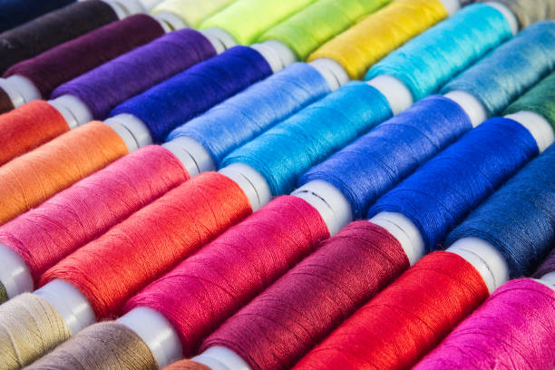 Full frame, colour sewing threads Full frame, colour sewing threads for background use spool stock pictures, royalty-free photos & images