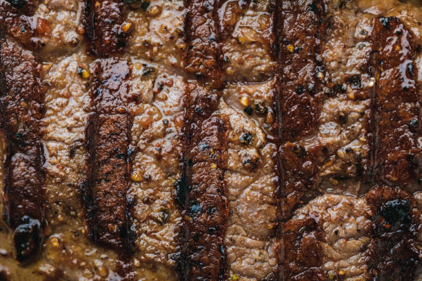 full frame of delicious spicy grilled steak full frame of delicious spicy grilled steak cooked meat stock pictures, royalty-free photos & images