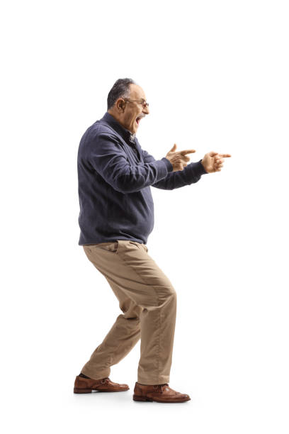 full length profile shot of a mature man dancing and gesturing with fingers - dancer white man on white imagens e fotografias de stock
