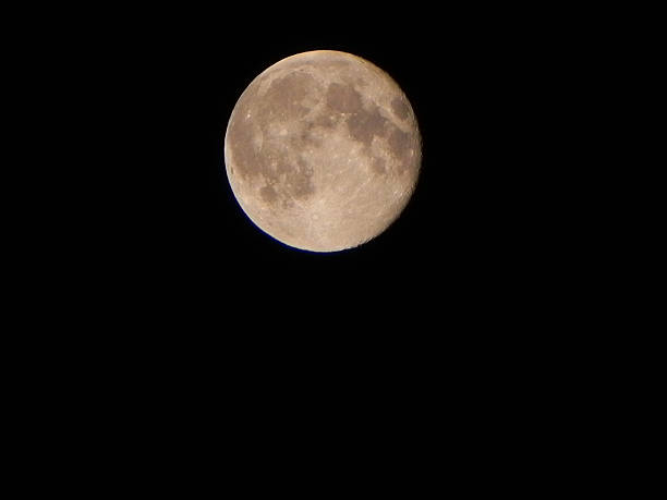 Full moon in the night sky stock photo