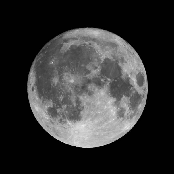 Full moon isolated on black night sky background stock photo