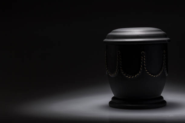funeral mourning urn, for obituary funeral urn, with tape and flower decorated, for sympathy, card funerary urn stock pictures, royalty-free photos & images