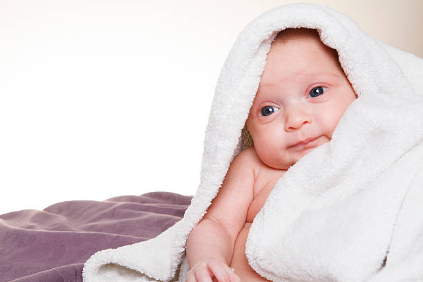 Funny Baby on Bed Funny Baby on Bed ugly girl stock pictures, royalty-free photos & images