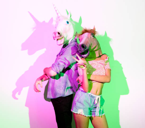 Funny horse and unicorn people Funny horse and unicorn people horse mask photos stock pictures, royalty-free photos & images