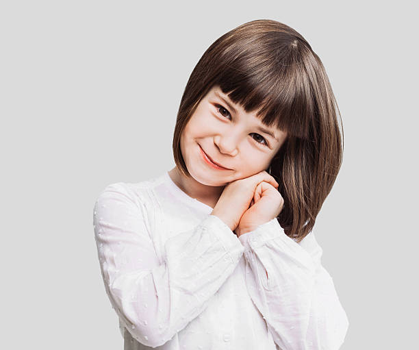 Funny little girl portrait Cute little girl portrait chinese girl hairstyle stock pictures, royalty-free photos & images