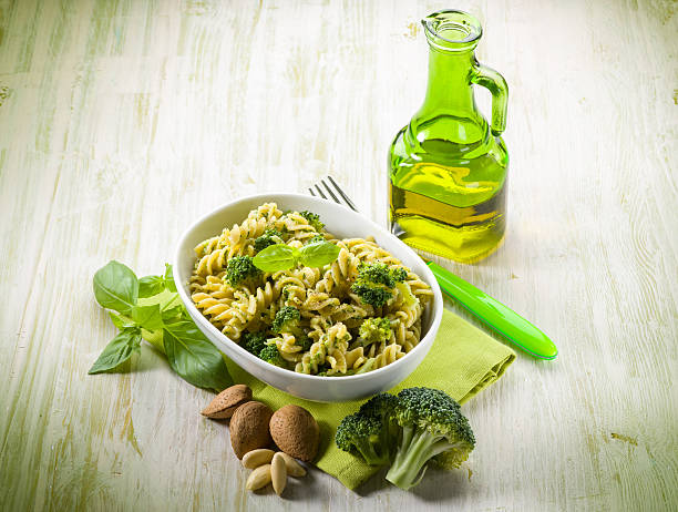 fusilli with broccoli and almond sauce stock photo