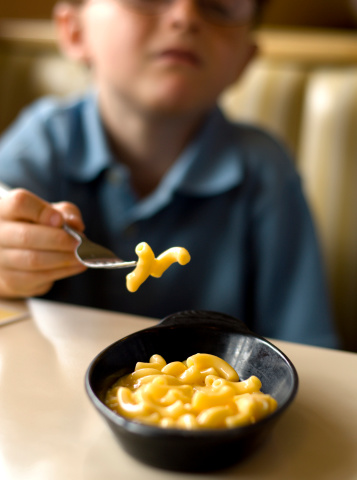 Fussy Boy Child Eating Macaroni Cheese Dinner At ...