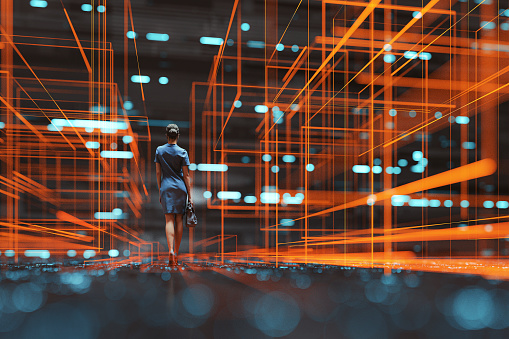 Futuristic city VR wire frame with businesswoman walking. This is entirely 3D generated image.