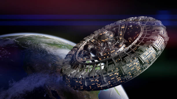 футуристическая космическая станция на орбите планеты земля - gravitation стоковые фото и изображения
