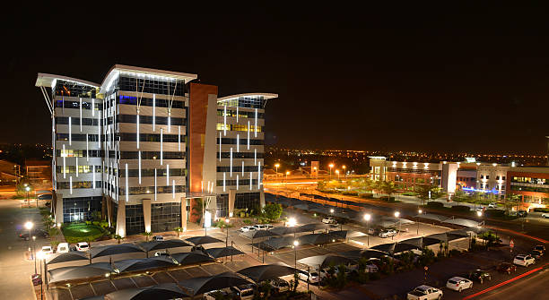 Gabarone city at night. Botswana Africa. Gabarone city centre at night. Taken after dark this is one of the taller buildings in the new city centre taken from above. botswana stock pictures, royalty-free photos & images