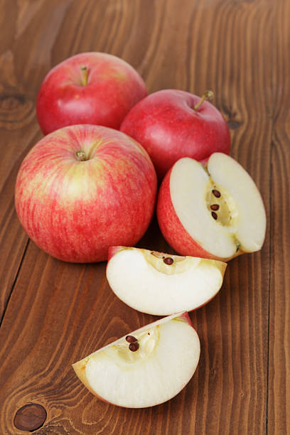 gala apples on wood table, rustic style