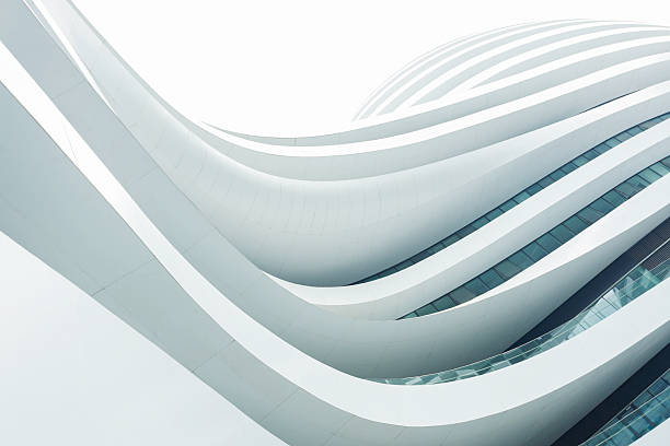 Galaxy Soho, Beijing Beijing, China - August 22, 2014: Curved buildings at the Galaxy Soho, a complex with office buildings, shopping mall, stores and restaurants. Galaxy Soho was designed by Zaha Hadid architects and opened in 2012. architecture stock pictures, royalty-free photos & images