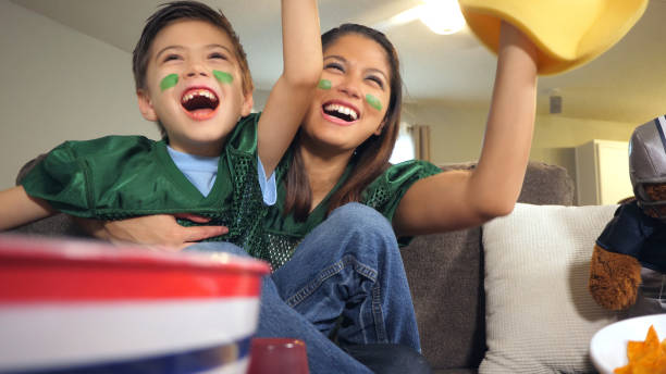 Game Day  asian kids watching tv stock pictures, royalty-free photos & images