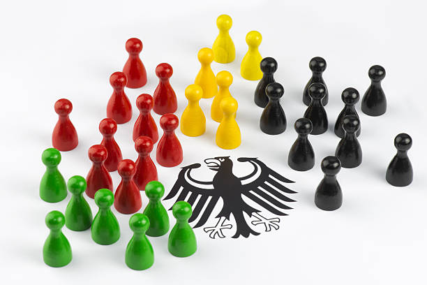Game figures with federal eagle Game figures with federal eagle symbolizing the major political parties in Germany. german social democratic party stock pictures, royalty-free photos & images