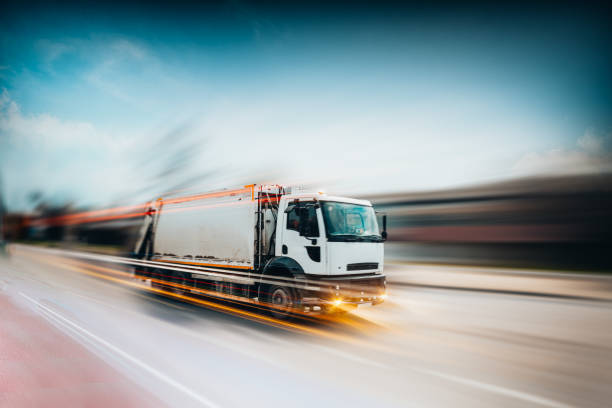 Garbage Truck in motion stock photo